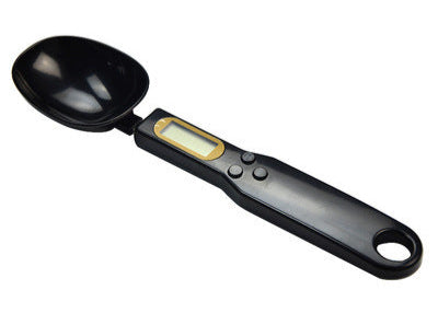 Digital measuring spoon on a white background